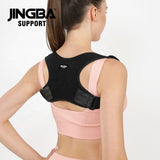 Woman wearing a black JINGBA Support brace on a white background Adjustable Posture Corrector for Back & Shoulder Support (JB-2005) - saska - saska.ae